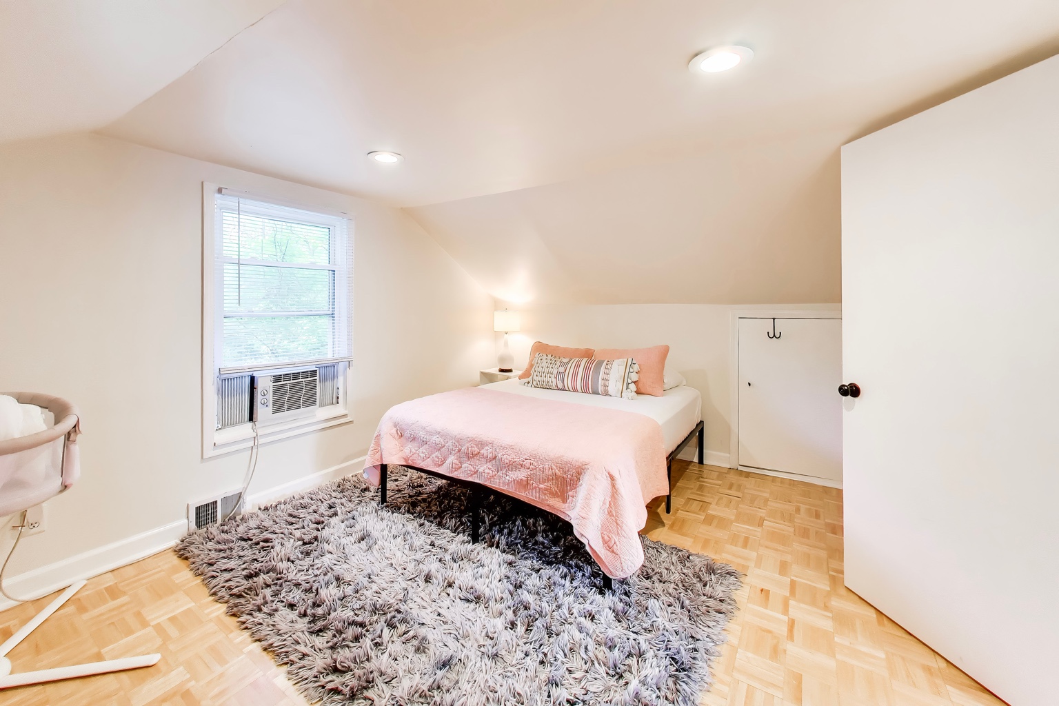 Bedroom at Emmet’s Place with a single bed beneath a sloped ceiling